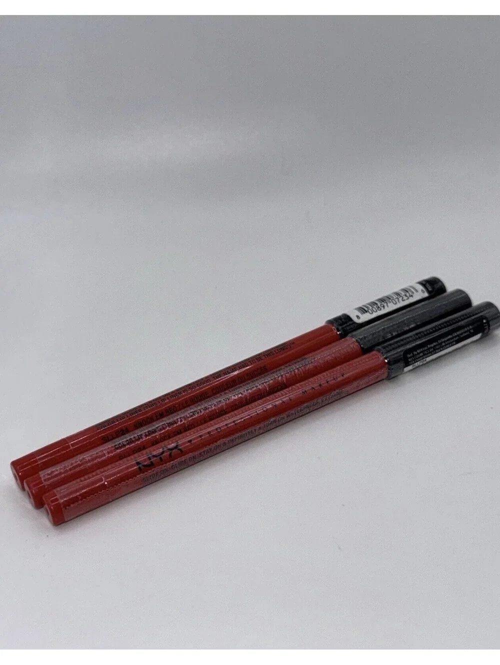 3 NYX Slide On Glide On Stay On Definitely A Turn On Lip Liner Knock Em Red